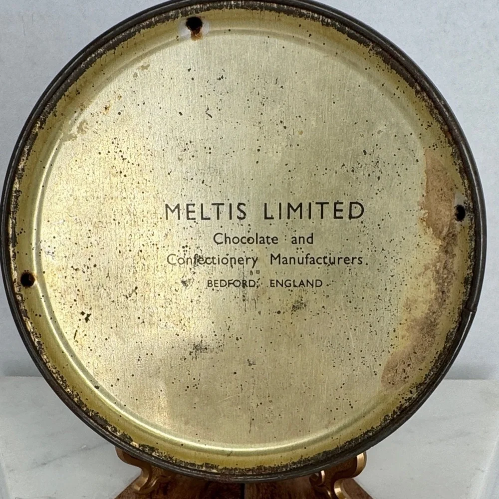 Antique Embossed Metal Meltis Limit Chocolate Tin Bedford, England